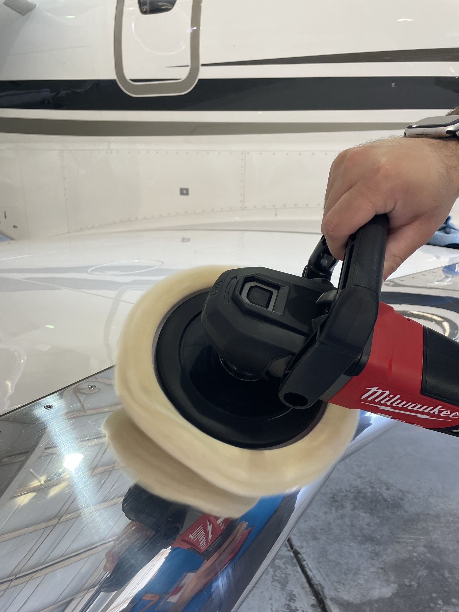 Professional Brightwork aluminum polish Detail Cleaning by Open Hangar on the leading edge of a jet