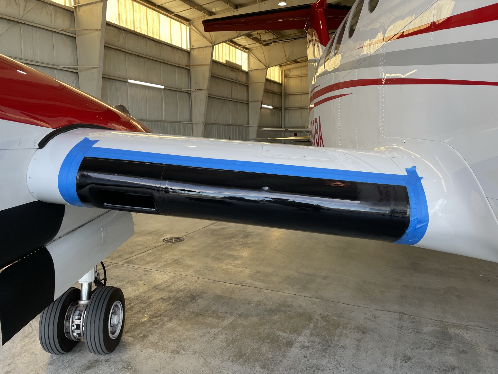 Boot Sealant application on King Air 200 by professional aircraft detailing crew Open Hangar